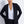 Load image into Gallery viewer, Woman wearing a black blazer over a white shirt against a light gray background
