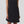 Load image into Gallery viewer, Black sleeveless dress worn by a person on a white background
