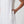 Load image into Gallery viewer, White sleeveless dress worn by a person on a plain background
